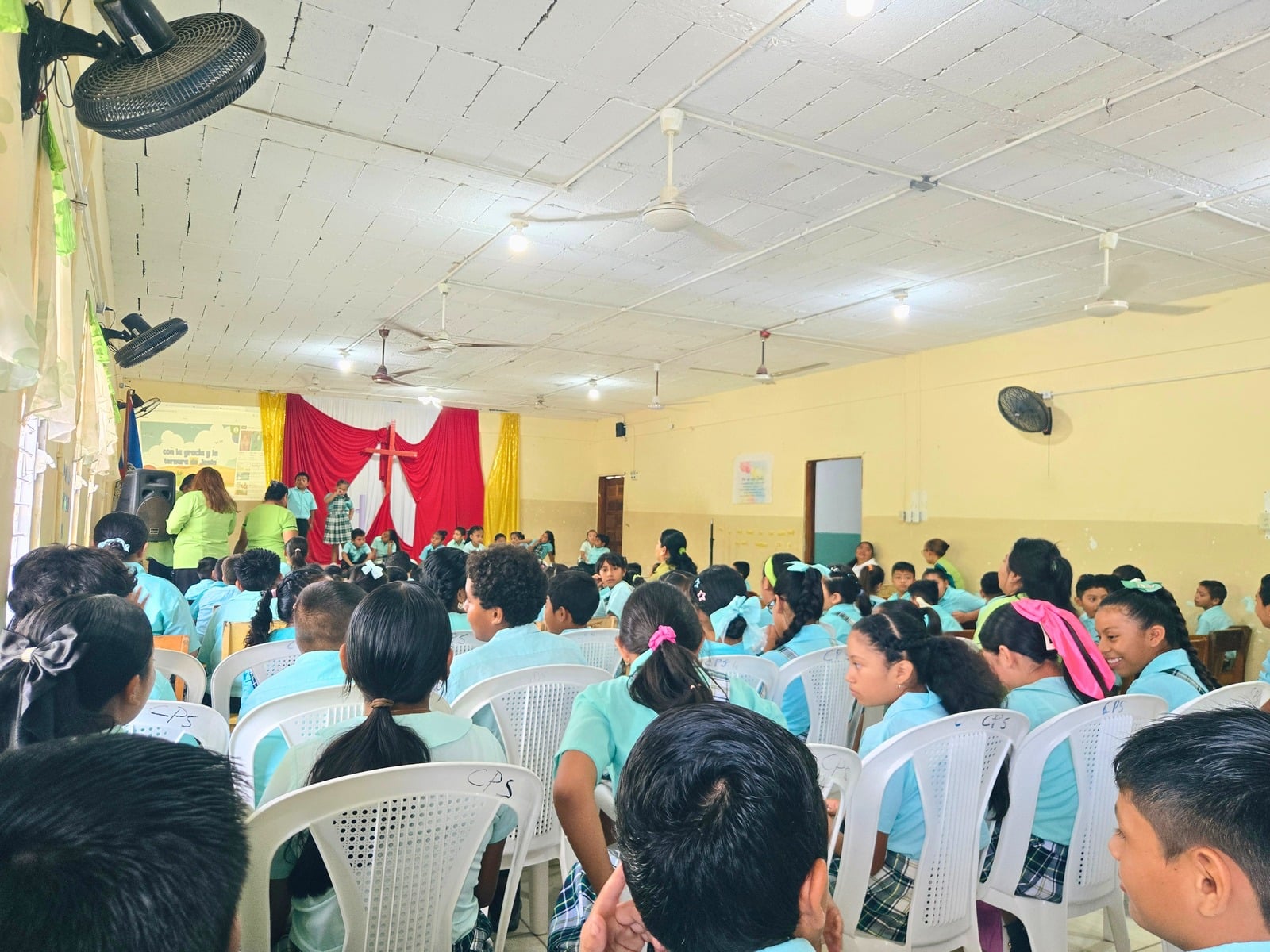 Students gathered in the school assembly hall