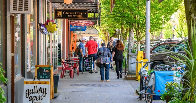Shops and pedestrians along a downtown Corvallis street