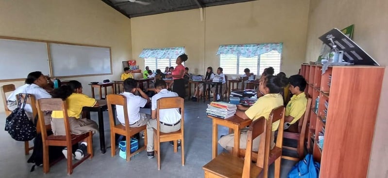 A team member teaching in a classroom