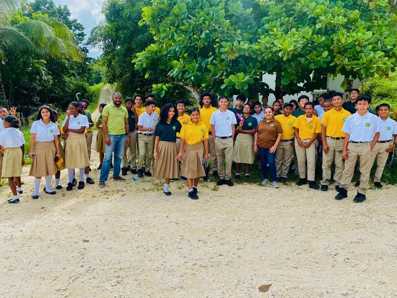 Students and staff gathered in their school uniforms
