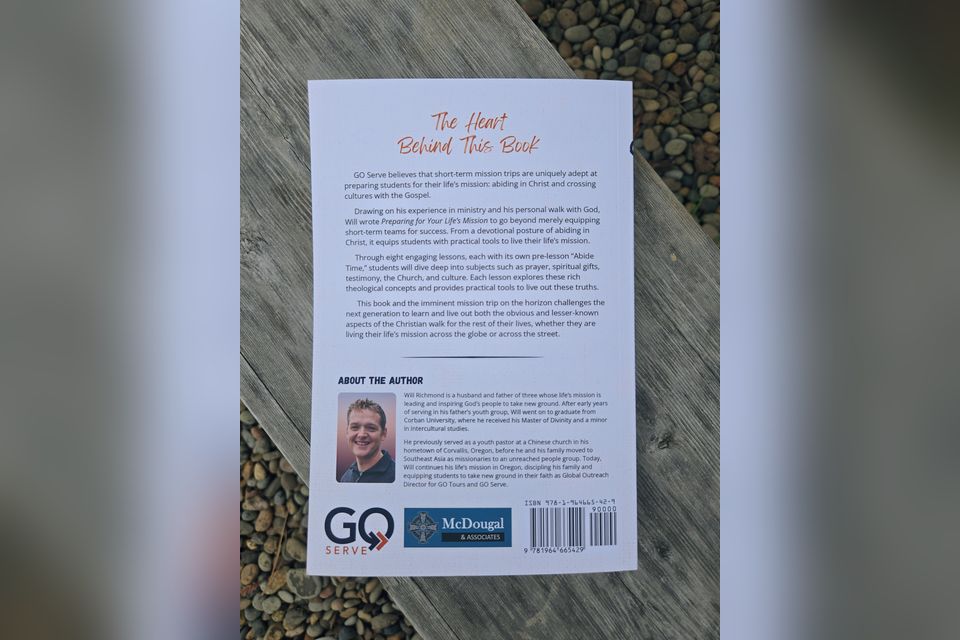 The back cover of the book with the author and the Behind This Book story