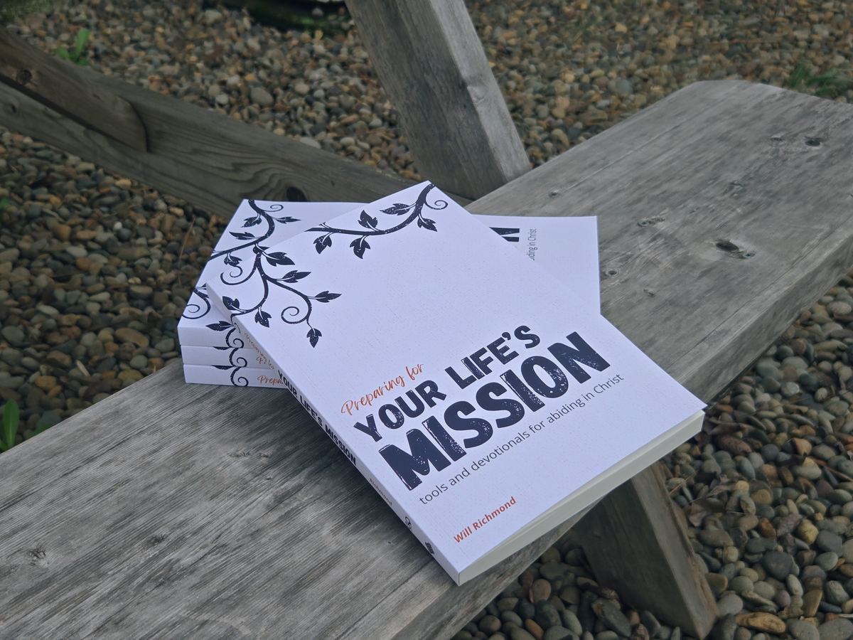 The book Preparing for Your Life&rsquo;s Mission resting on a wooden bench