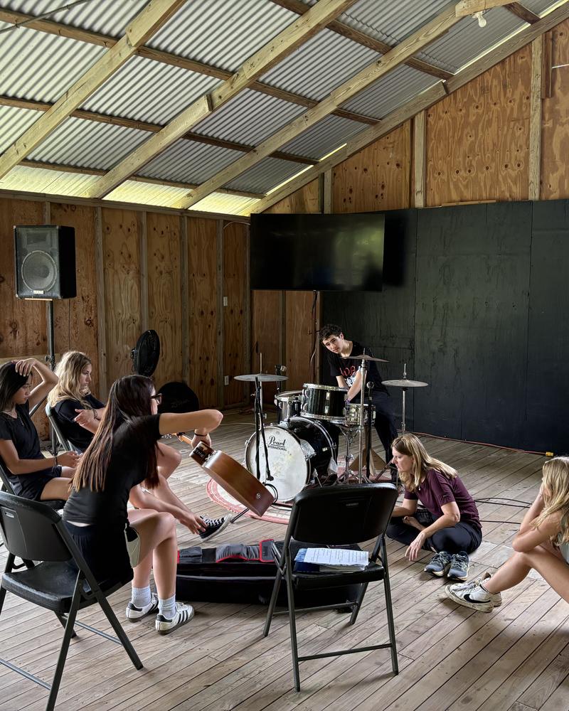 Homeschool group students practicing music together