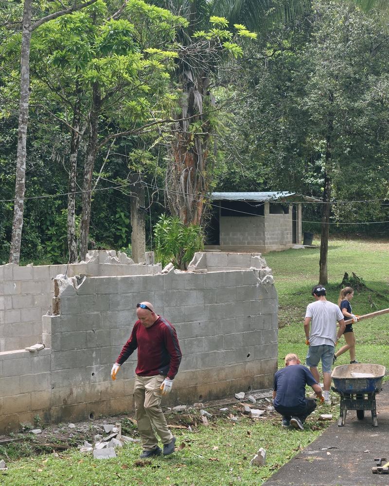 A university-age team working together outside